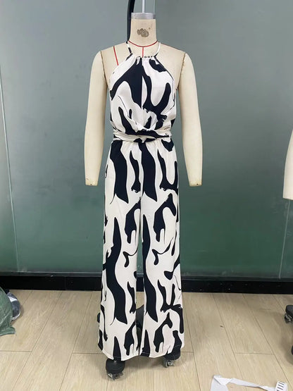 Macacão Feminino Longo com Decote Halter – Estampado, sem Mangas, Cintura Alta com Laço e Calça de Perna Larga